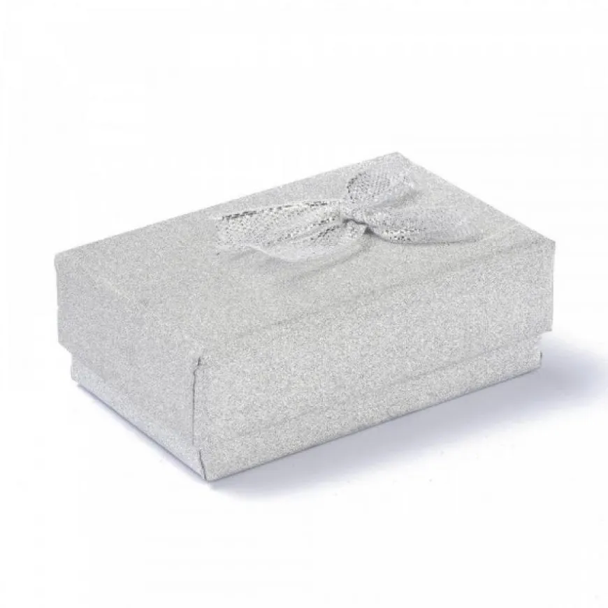 boîte argent avec paillettes carton pour une fête d'anniversaire