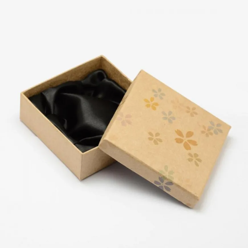 emballage carton kraft marron pour toutes les occasions avec un motif avec des fleurs
