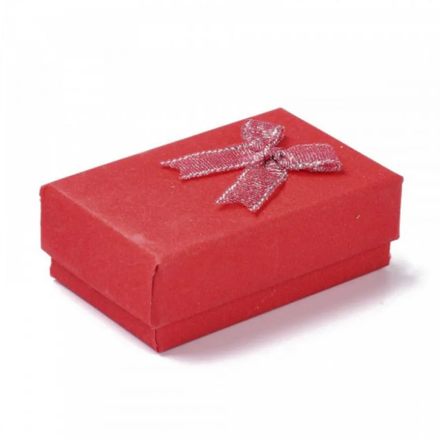 emballage carton rouge avec paillettes décoratives pour le plaisir d'offrir