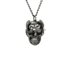 Pendentif tete de mort montre noir